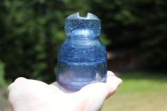 Awesome air bubbly sky blue glass insulator