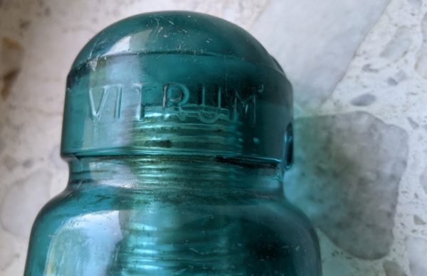 old glass insulator with rare embossing - Vitrum