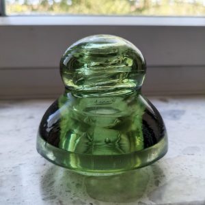Old glass insulator rare yellow olivey green color