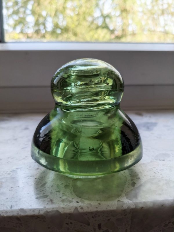 Old glass insulator rare yellow olivey green color